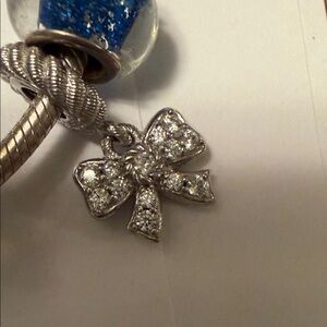 Judith Ripka Silver Bracelet with Glittering Blue Bead and Bow